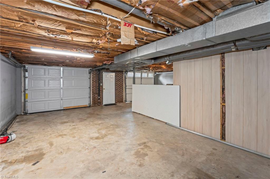 142 Cameron Road Lexington, NC 27295 - Photo 38 of 41 Basement Garage 2 view from Storage/Workshop area