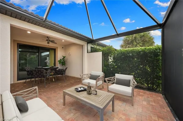 a view of swimming pool with outdoor seating yard and furniture