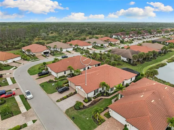an aerial view of a house with a garden