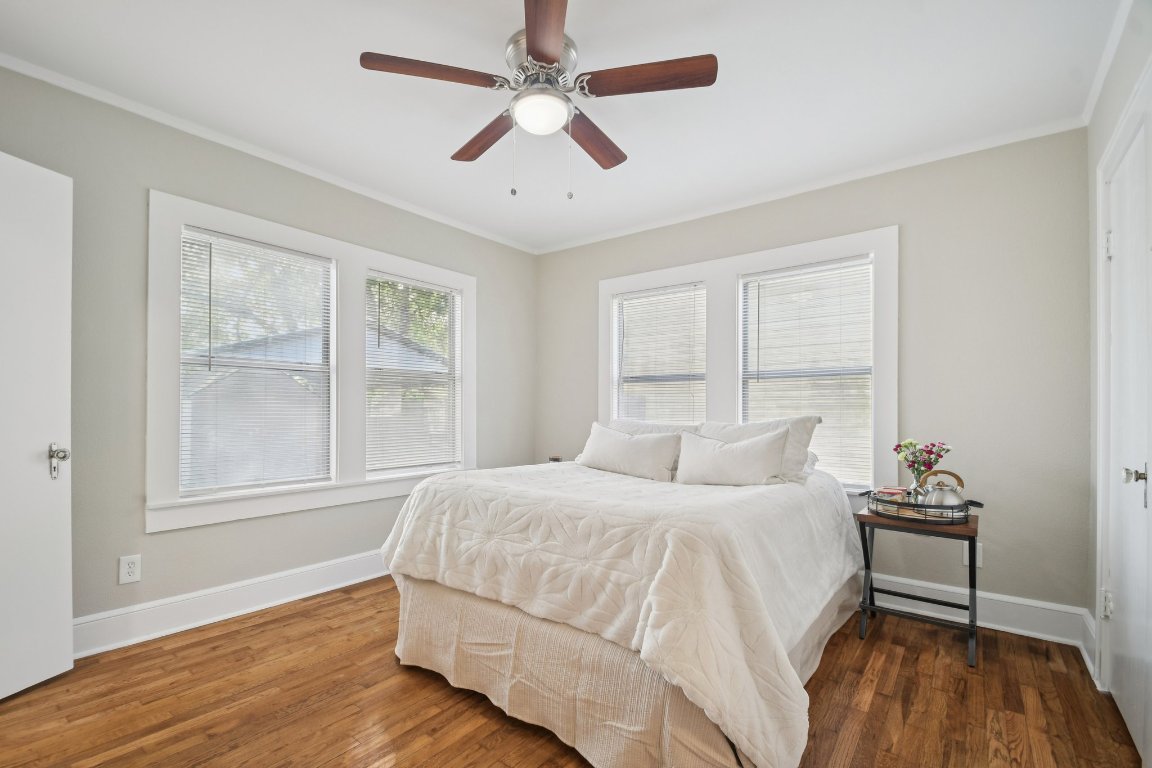 209 East 8th Street Elgin, TX 78621 - Photo 14 of 23 a bedroom with a bed and a window