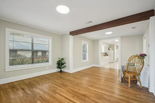 a view of dining room with furniture and window