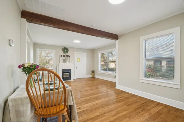 a view of livingroom with furniture window and front door