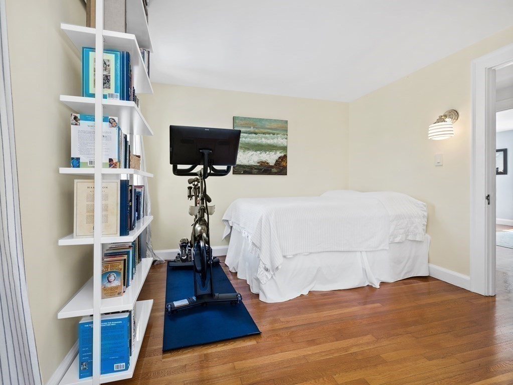 4 Malcolm Road Boston, MA 02130 - Photo 16 of 34 a bed room with a bed and a television