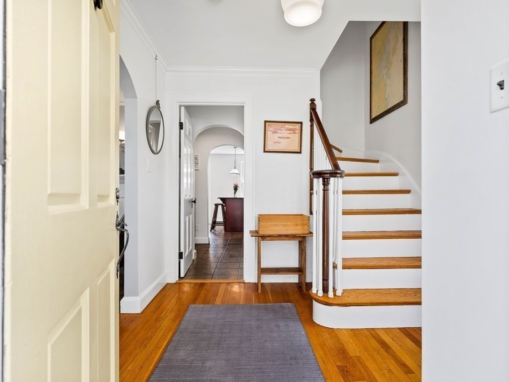 4 Malcolm Road Boston, MA 02130 - Photo 2 of 34 a view of entryway and hall with wooden floor