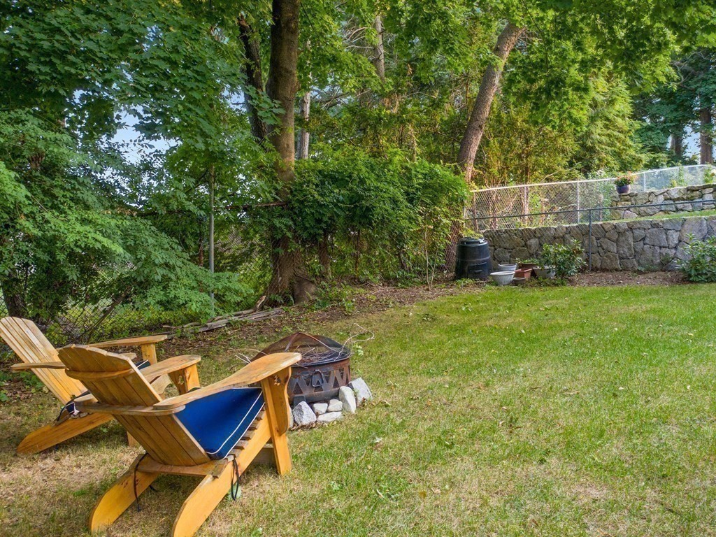 4 Malcolm Road Boston, MA 02130 - Photo 26 of 34 a view of an outdoor sitting area with chairs