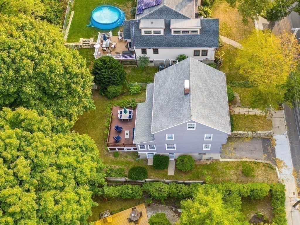 4 Malcolm Road Boston, MA 02130 - Photo 29 of 34 a aerial view of a house with a yard and a large tree