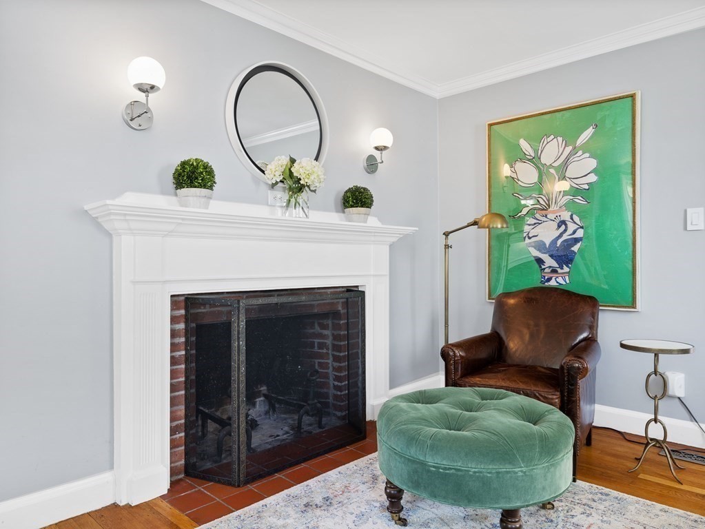4 Malcolm Road Boston, MA 02130 - Photo 6 of 34 a living room with furniture and a fireplace