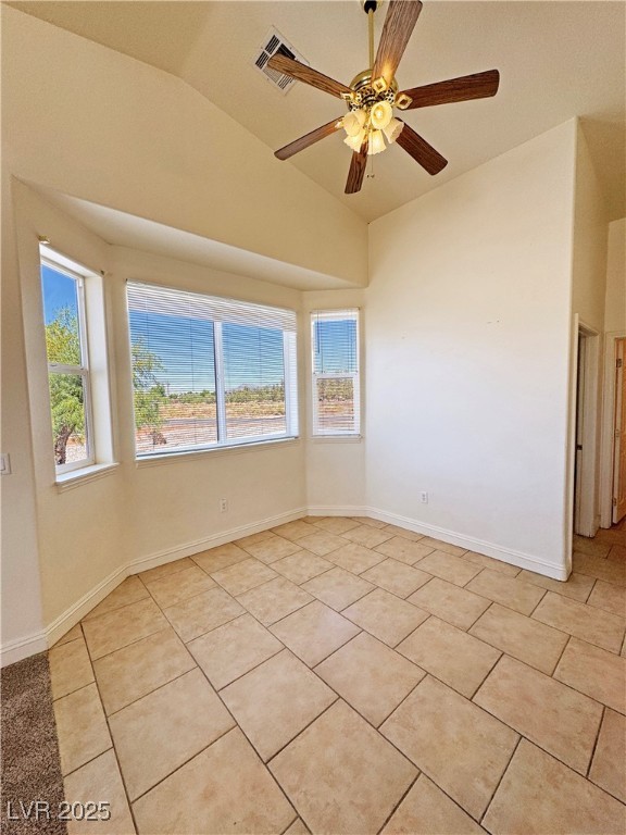 1771 Labrador Street Pahrump, NV 89048 - Photo 22 of 64 Spare room with light tile patterned flooring, lofted ceiling, and ceiling fan