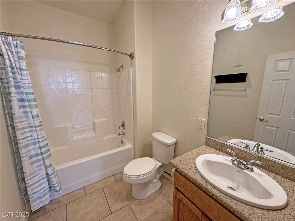 1771 Labrador Street Pahrump, NV 89048 - Photo 26 of 64 Full bath with shower / bath combo, vanity, and tile patterned flooring