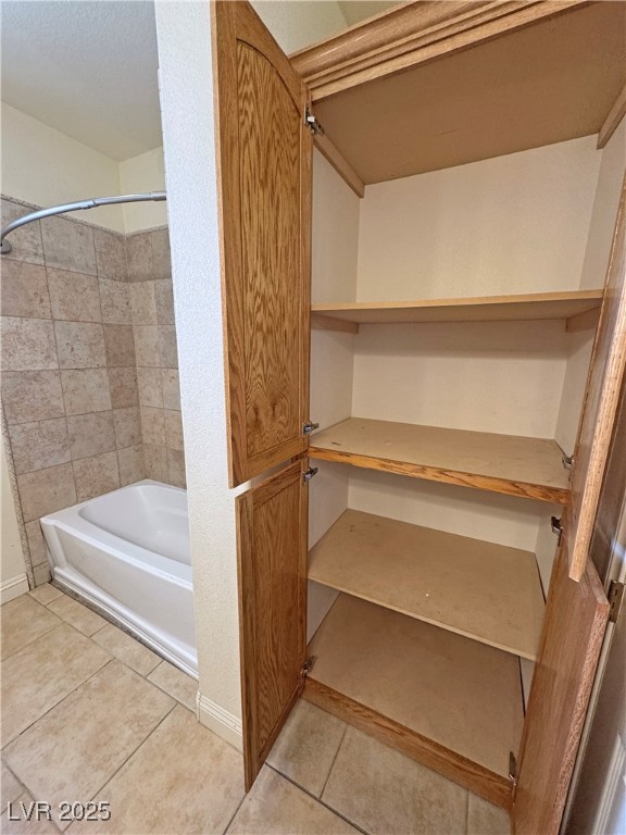 1771 Labrador Street Pahrump, NV 89048 - Photo 42 of 64 Bathroom with tile patterned floors and bathing tub / shower combination