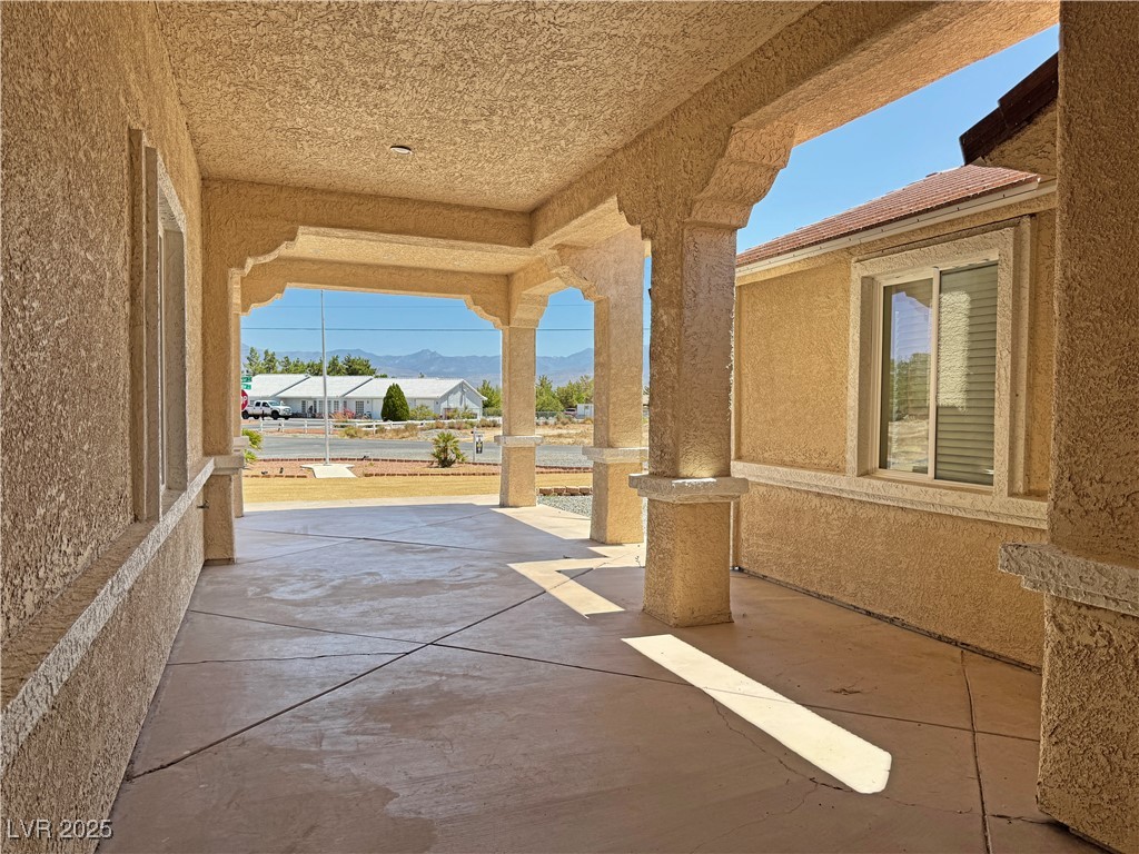 1771 Labrador Street Pahrump, NV 89048 - Photo 5 of 64 View of patio / terrace featuring a mountain view