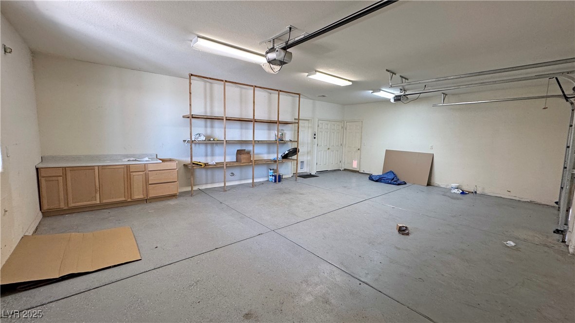 1771 Labrador Street Pahrump, NV 89048 - Photo 50 of 64 Garage with a garage door opener