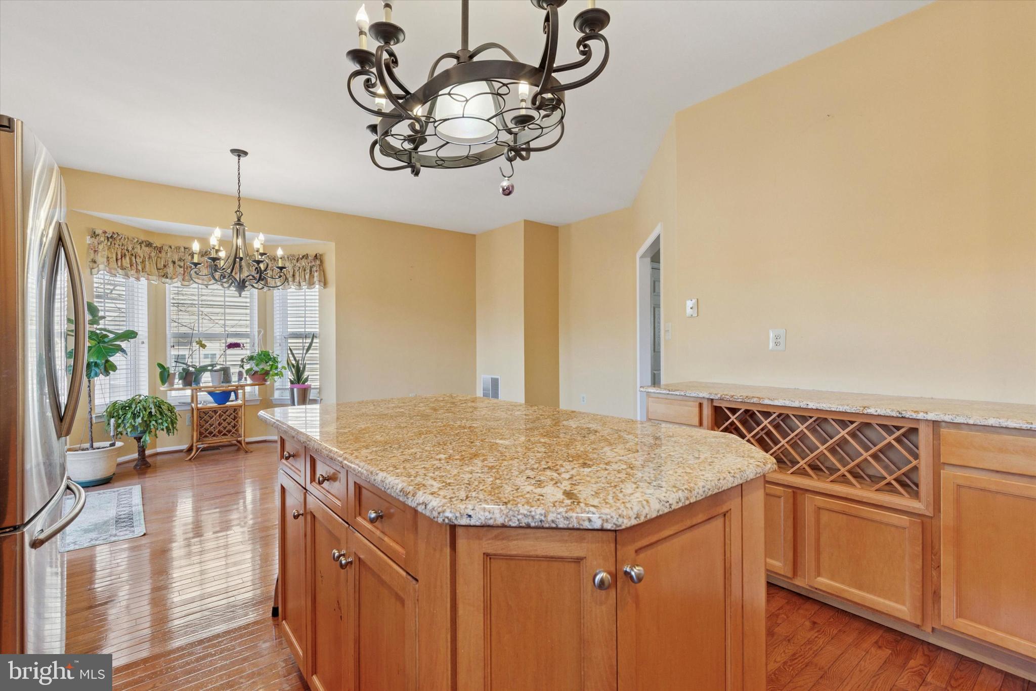 95 Arbor Circle Colmar, PA 18915 - Photo 11 of 26 a kitchen with a sink and chandelier