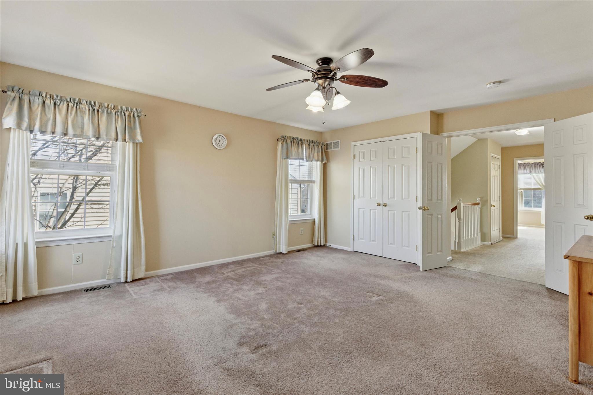 95 Arbor Circle Colmar, PA 18915 - Photo 17 of 26 an empty room with fan and windows