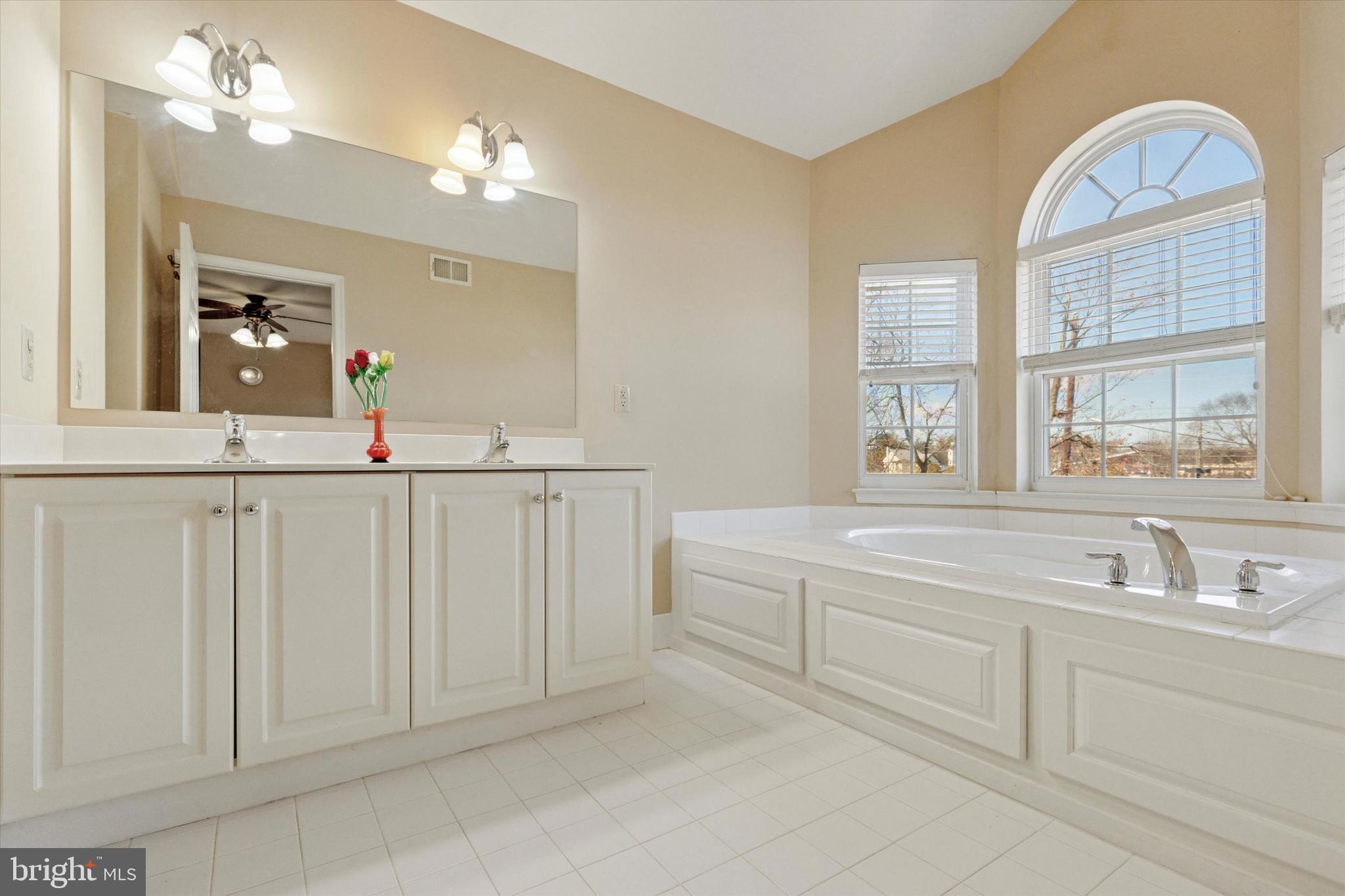 95 Arbor Circle Colmar, PA 18915 - Photo 18 of 26 a bathroom with a sink and a mirror