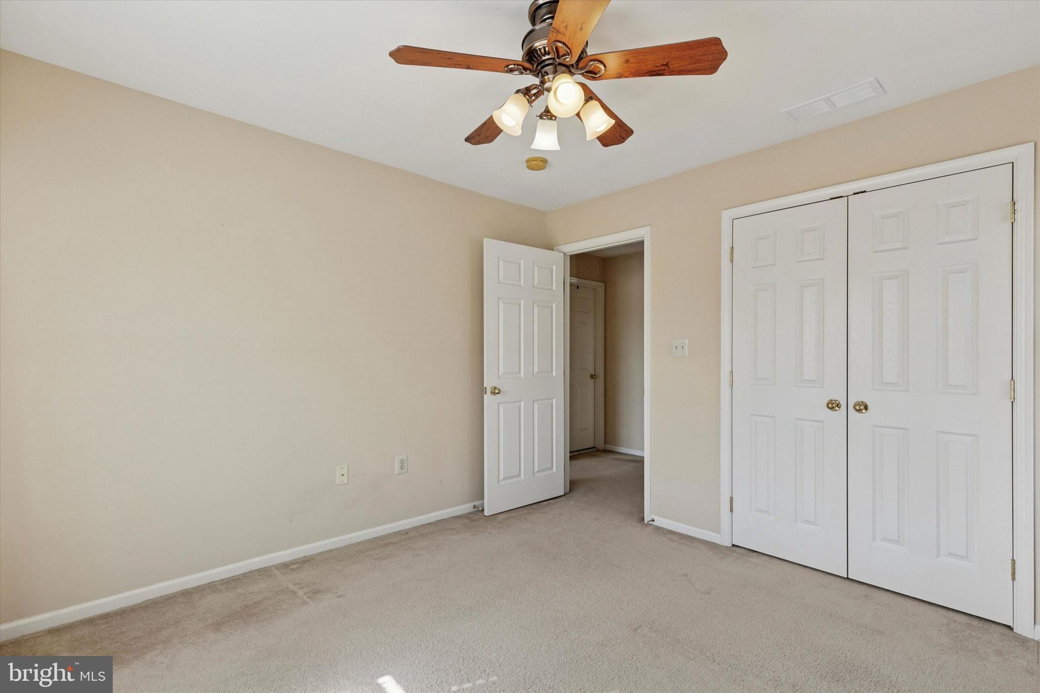 95 Arbor Circle Colmar, PA 18915 - Photo 21 of 26 an empty room with windows and fan