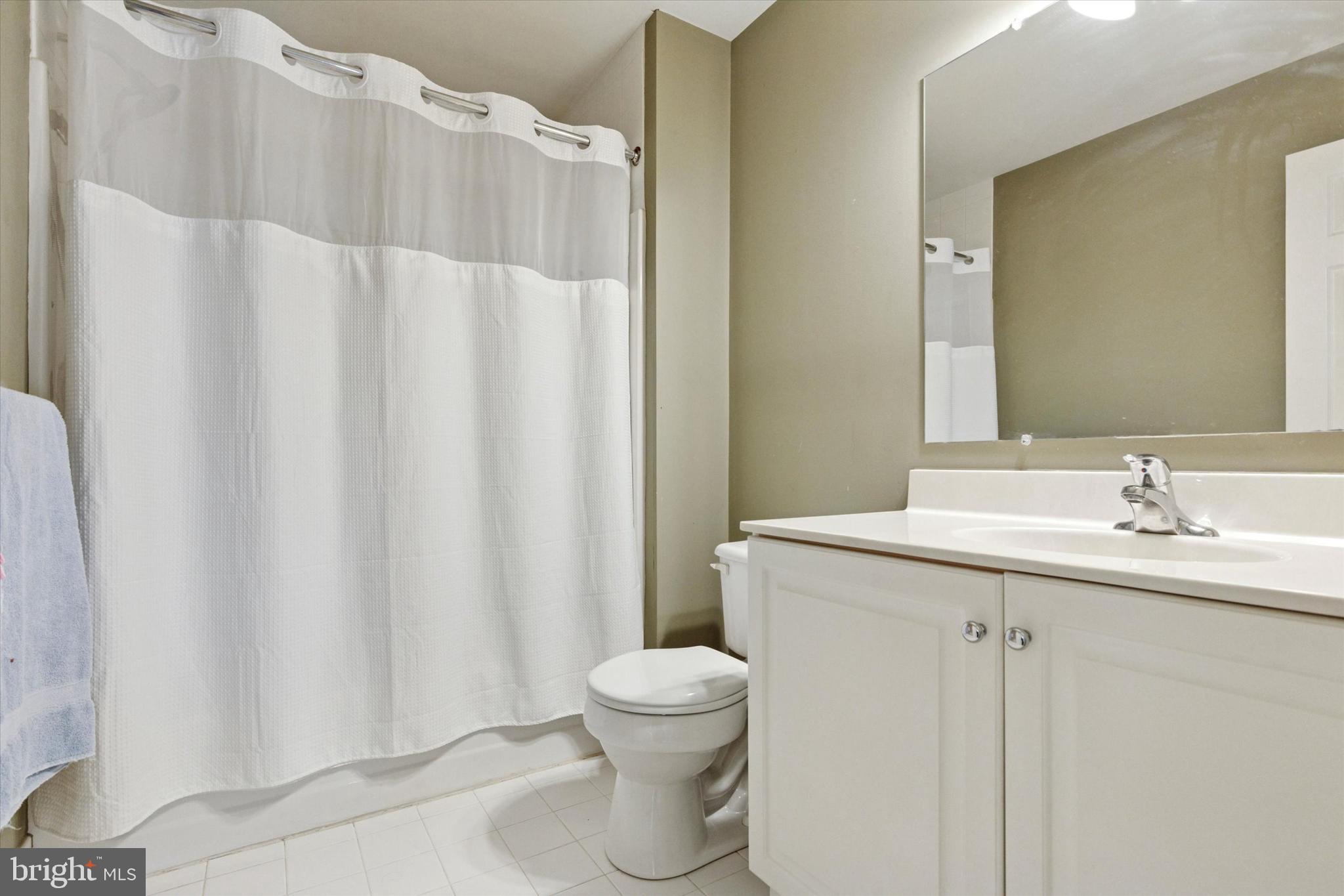95 Arbor Circle Colmar, PA 18915 - Photo 23 of 26 a bathroom with a sink and a mirror