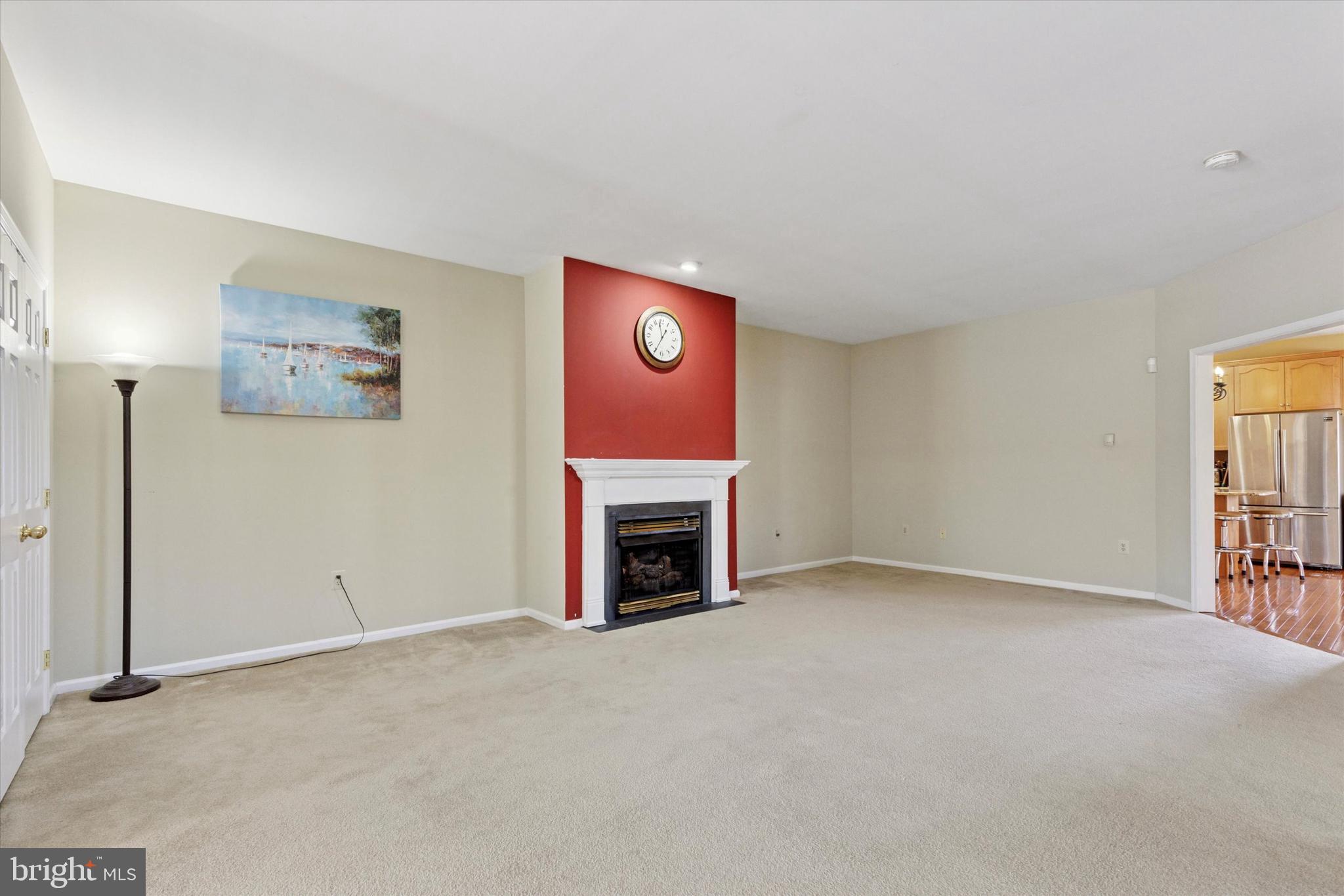 95 Arbor Circle Colmar, PA 18915 - Photo 4 of 26 a view of an empty room with a fireplace