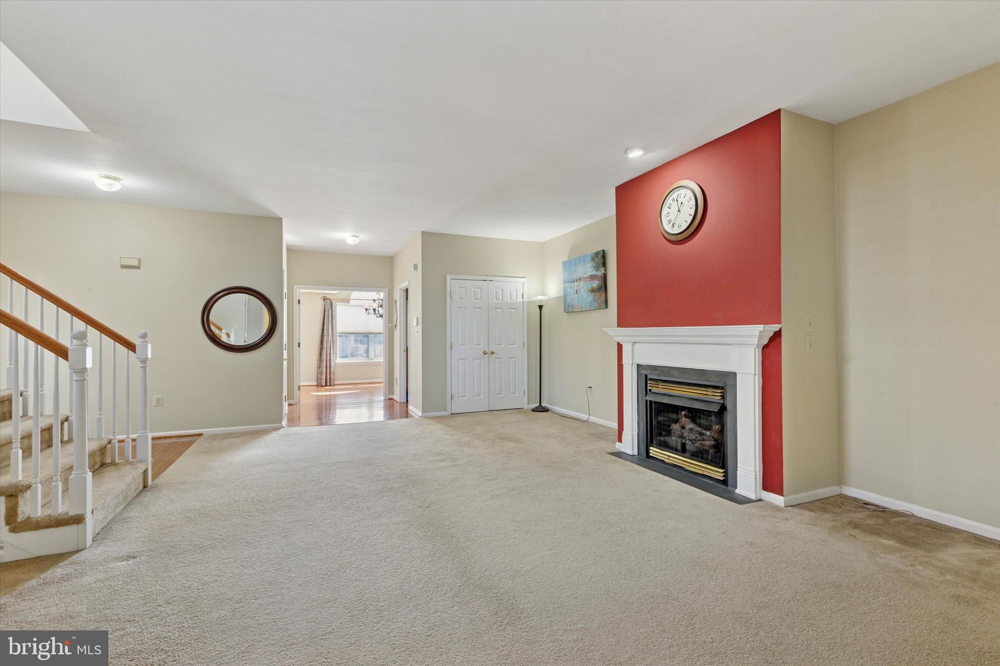 95 Arbor Circle Colmar, PA 18915 - Photo 5 of 26 a view of an empty room with a fireplace and a window