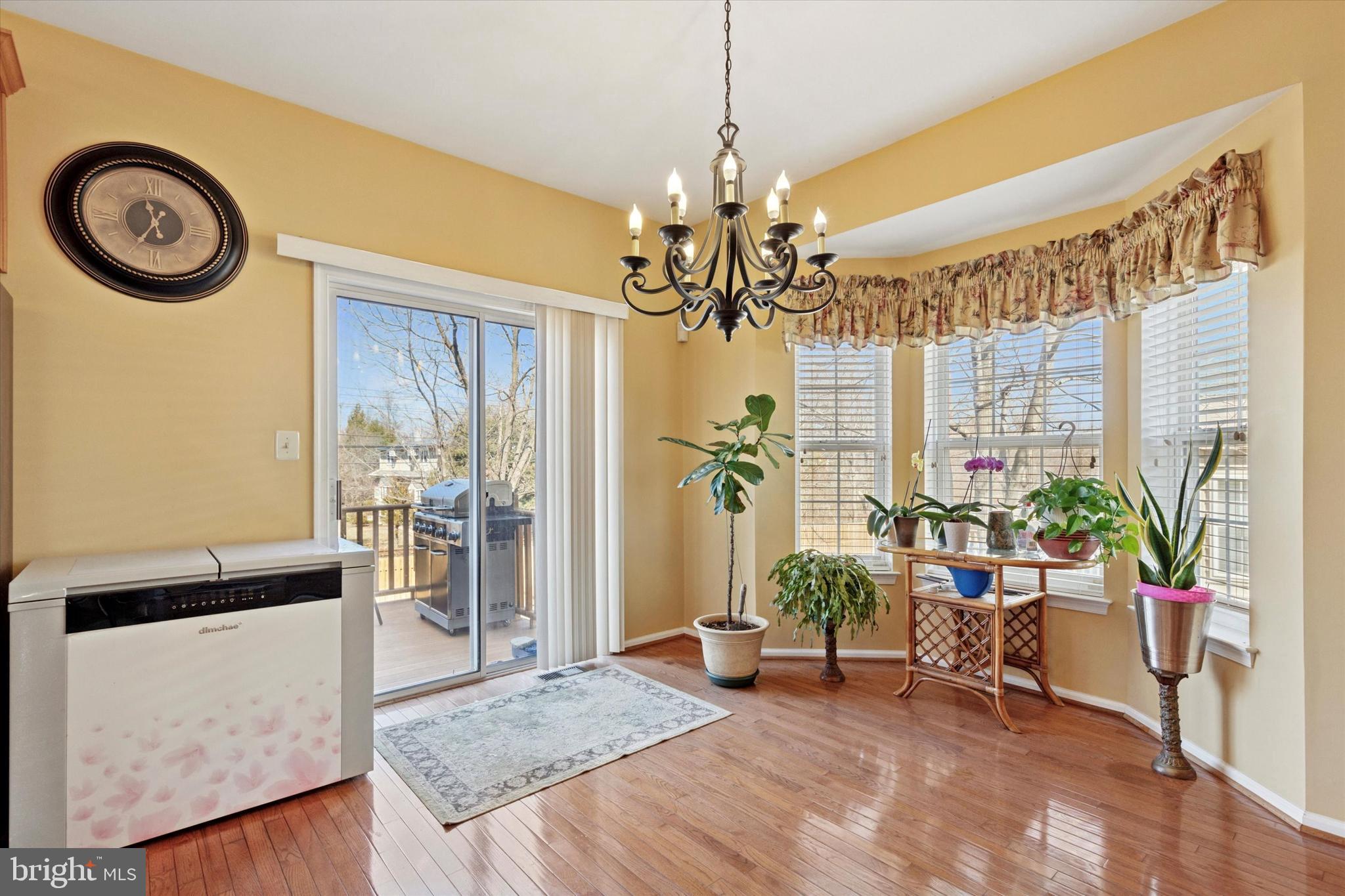 95 Arbor Circle Colmar, PA 18915 - Photo 9 of 26 a living room with furniture and a chandelier