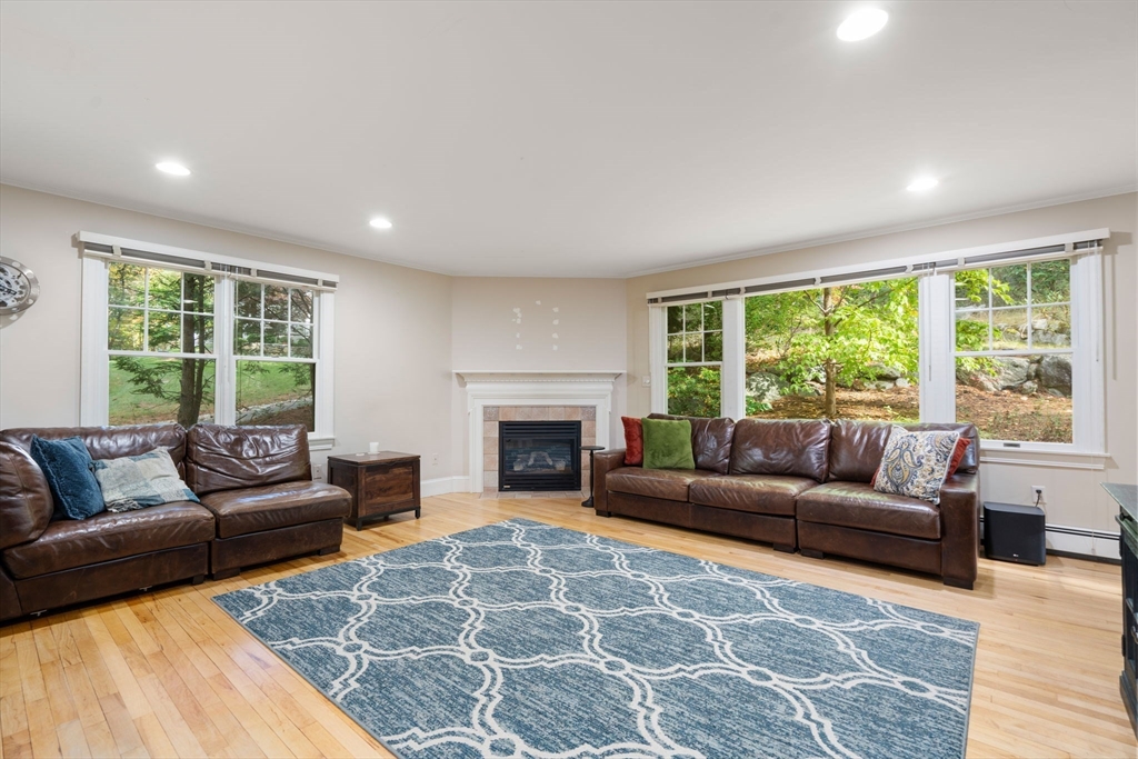 61 Silver Hill Road Weston, MA 02493 - Photo 11 of 39 a living room with furniture and a large window