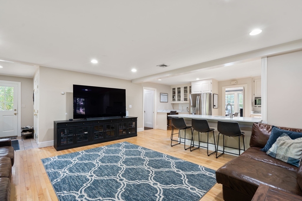 61 Silver Hill Road Weston, MA 02493 - Photo 13 of 39 a living room with furniture and a flat screen tv