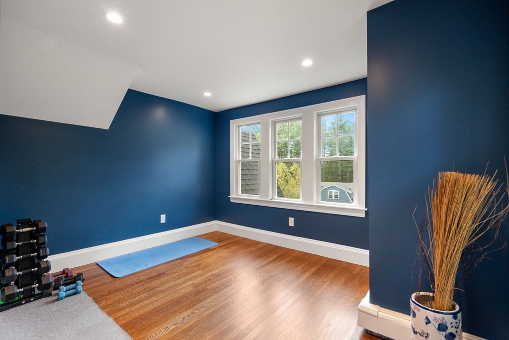 61 Silver Hill Road Weston, MA 02493 - Photo 18 of 39 a view of a room with a large window