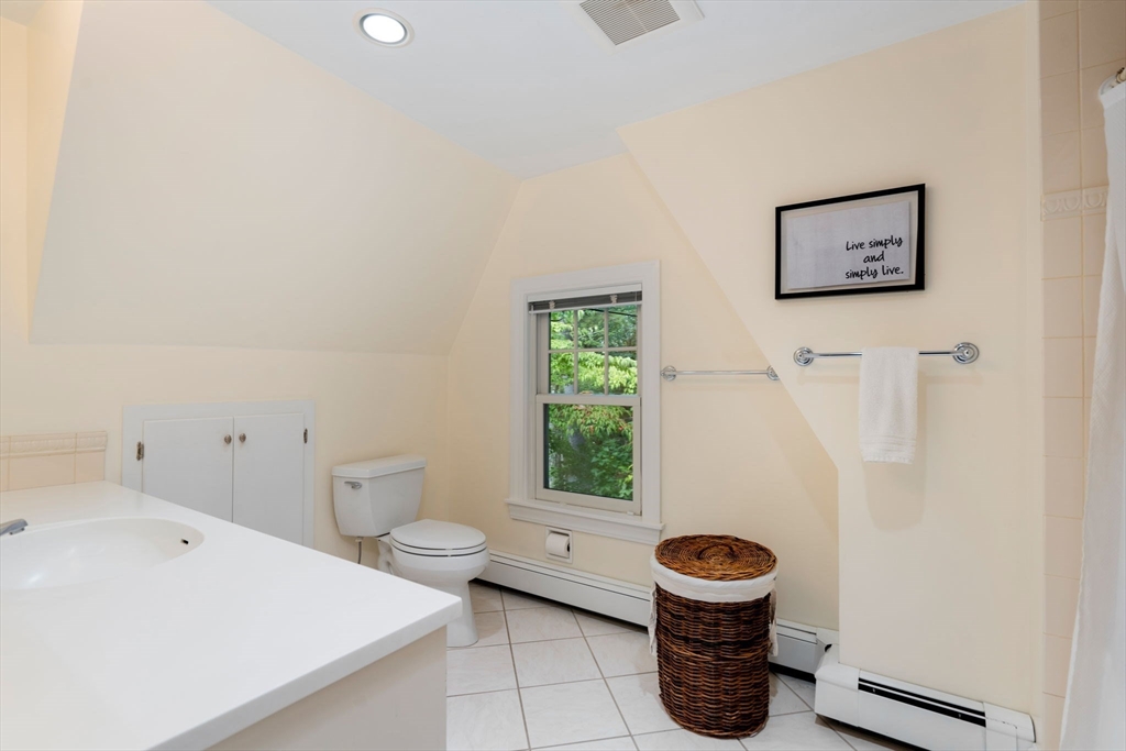 61 Silver Hill Road Weston, MA 02493 - Photo 19 of 39 a bathroom with a toilet and a shower