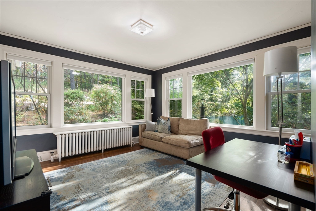 61 Silver Hill Road Weston, MA 02493 - Photo 22 of 39 a living room with furniture and a large window