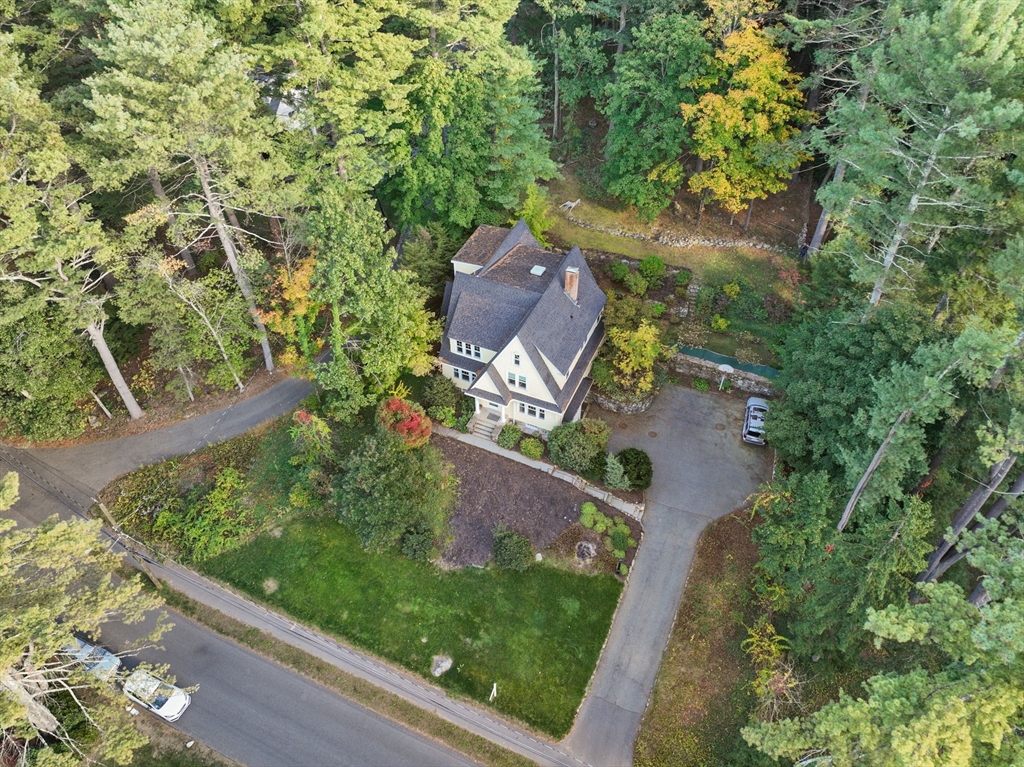61 Silver Hill Road Weston, MA 02493 - Photo 34 of 39 an aerial view of a house with a yard and outdoor seating