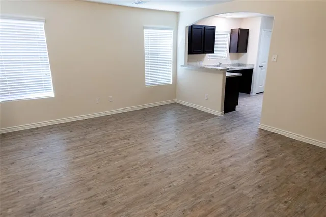 a view of a bathroom with a sink and mirror