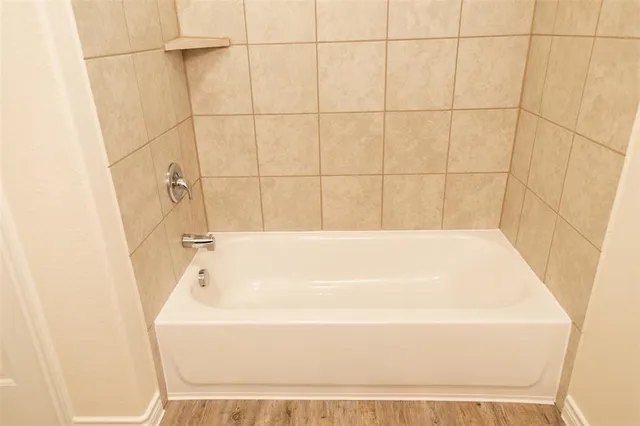 a bathroom with a bathtub