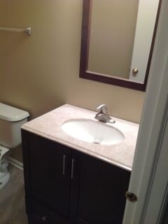 3144 Falling Waters Lane, Unit 3142 Lindenhurst, IL 60046 - Photo 15 of 16 a bathroom with a sink and a toilet