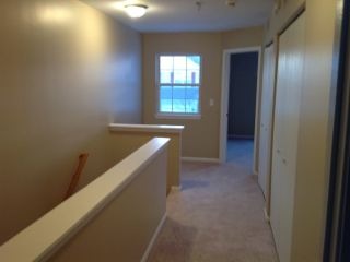 3144 Falling Waters Lane, Unit 3142 Lindenhurst, IL 60046 - Photo 10 of 16 a view of hallway with windows