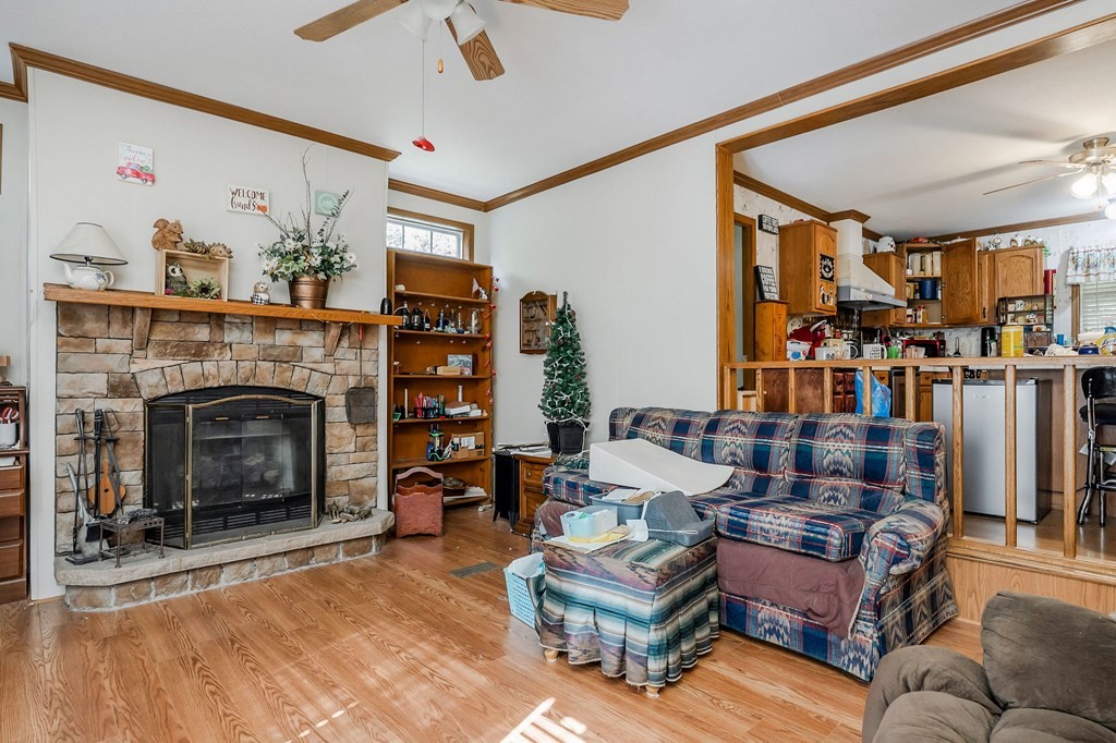 30211 White Oak Road Crawford, TN 38554 - Photo 12 of 24 a living room with furniture and a fireplace