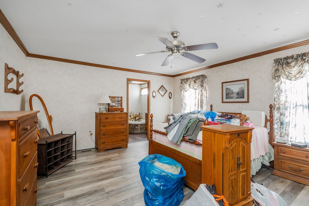 30211 White Oak Road Crawford, TN 38554 - Photo 15 of 24 a living room with furniture and wooden floor