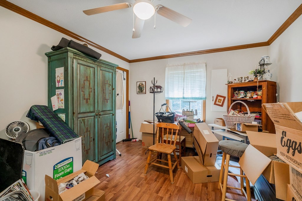 30211 White Oak Road Crawford, TN 38554 - Photo 18 of 24 a living room with furniture and a wooden floor