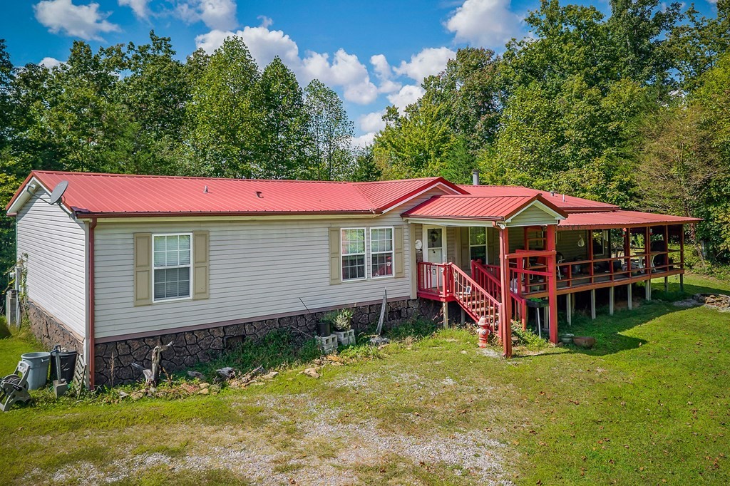 30211 White Oak Road Crawford, TN 38554 - Photo 2 of 24 a view of a house with a yard