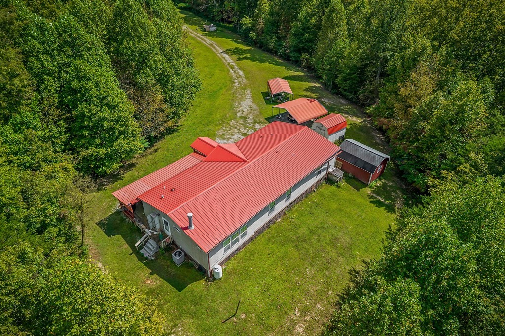30211 White Oak Road Crawford, TN 38554 - Photo 8 of 24 an aerial view of a house with a yard