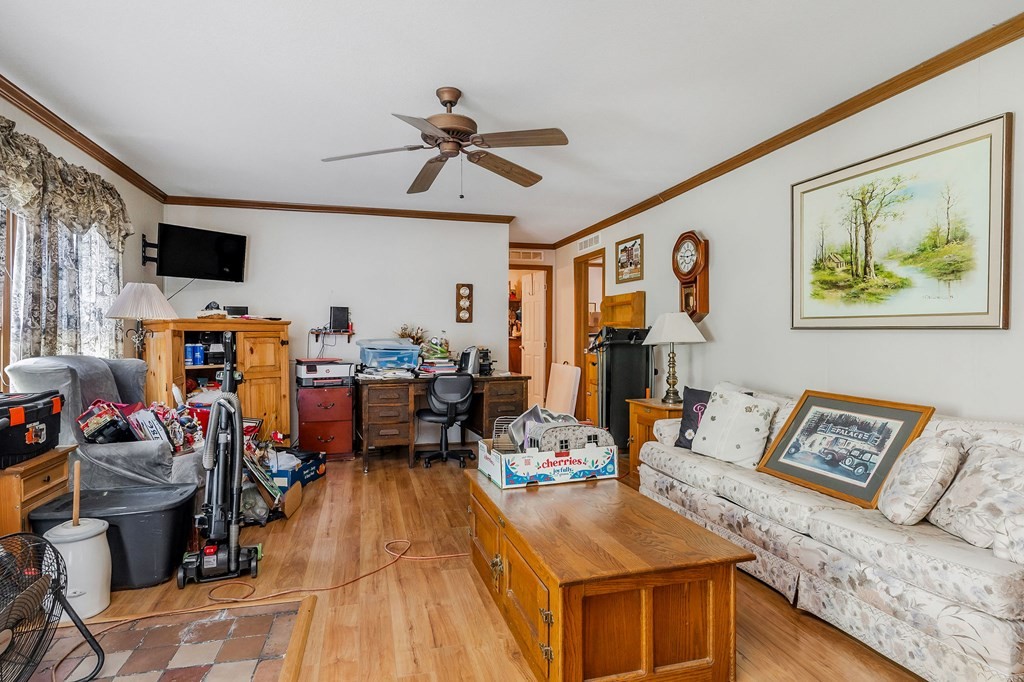 30211 White Oak Road Crawford, TN 38554 - Photo 10 of 24 a living room with furniture and flat screen tv