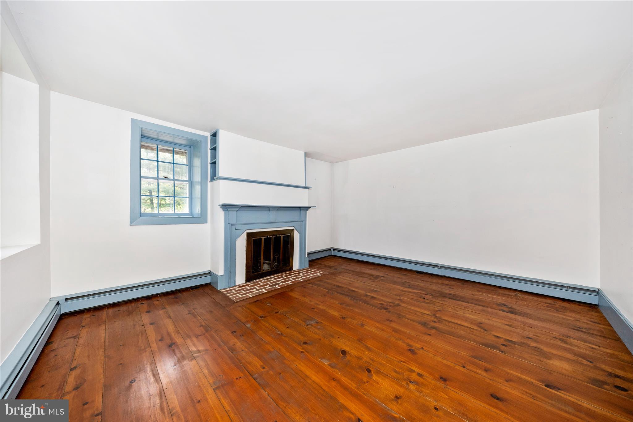 2301 Mt Ephraim Road Adamstown, MD 21710 - Photo 5 of 54 Front parlor features a fireplace