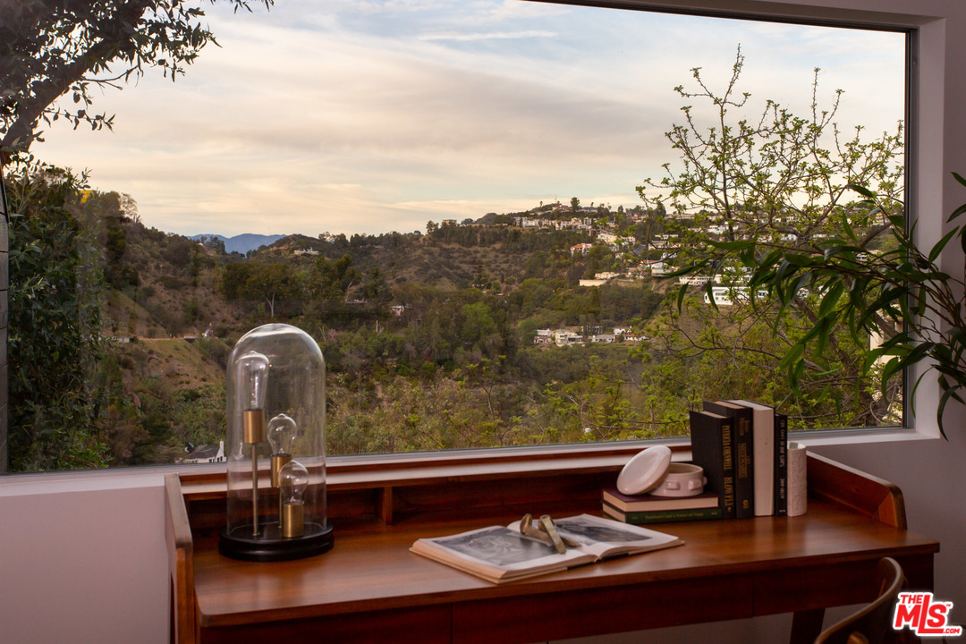 8321 Grand View Drive Los Angeles, CA 90046 - Photo 17 of 28 a view of house with a sitting area