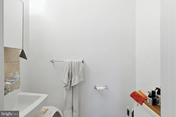 a bathroom with a sink and a shower