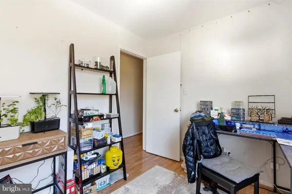 a view of a workspace with furniture