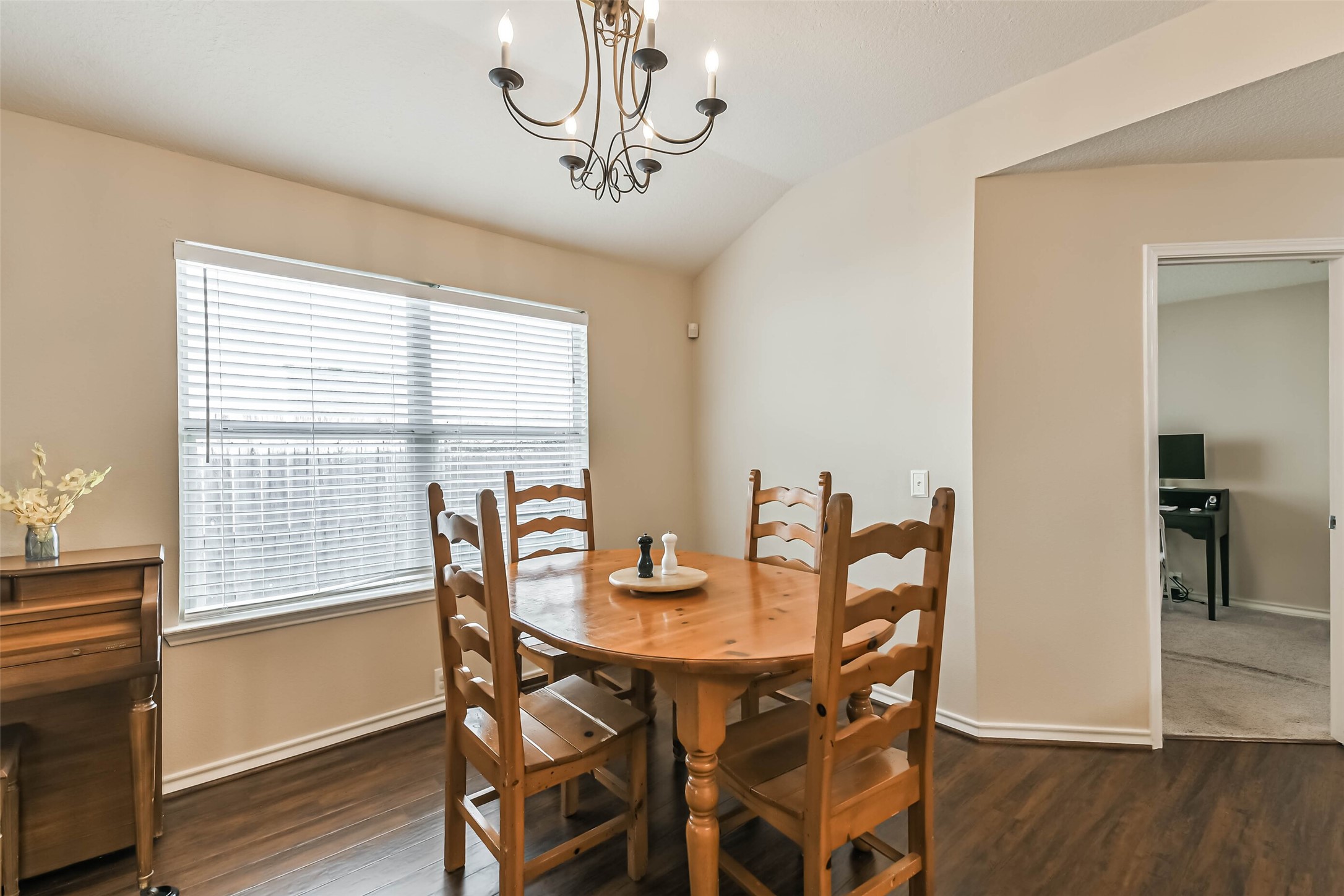 18239 Trinity Knoll Way Humble, TX 77346 - Photo 21 of 38 a view of a dining room with furniture window and wooden floor