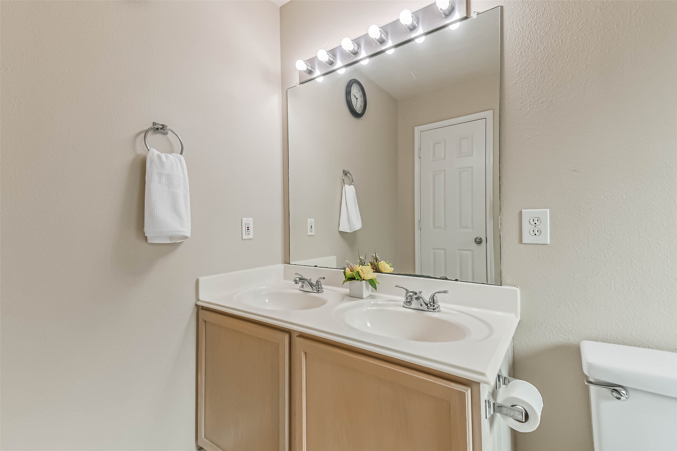 18239 Trinity Knoll Way Humble, TX 77346 - Photo 35 of 38 a bathroom with a sink and a mirror