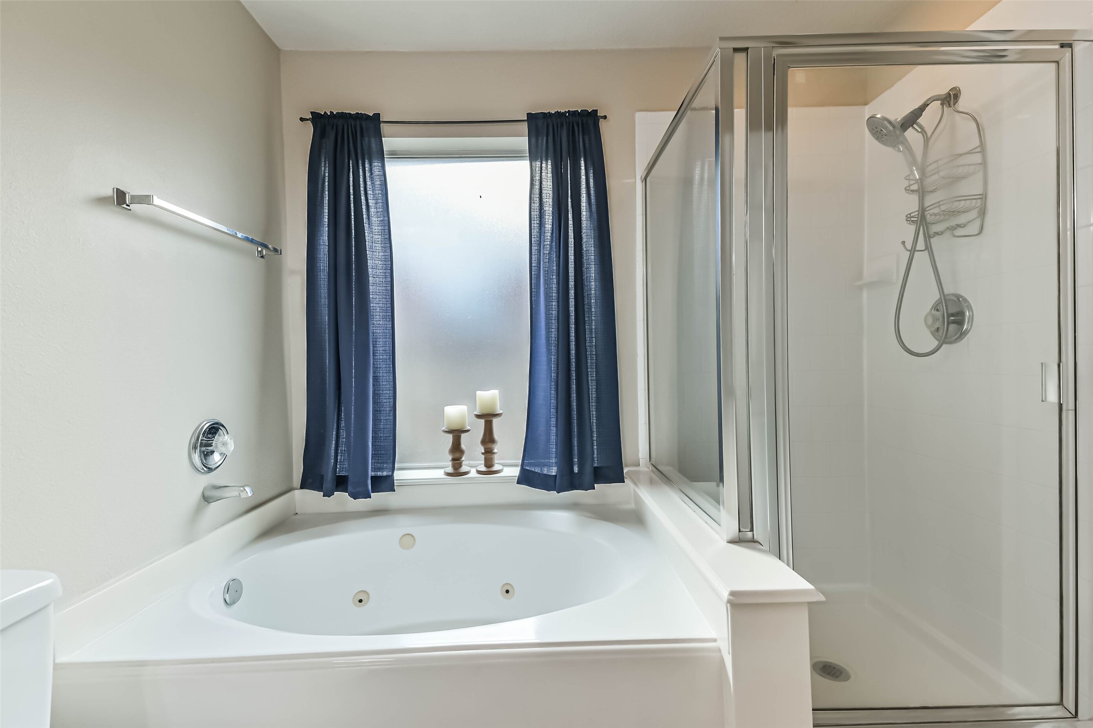 18239 Trinity Knoll Way Humble, TX 77346 - Photo 36 of 38 a bathroom with a bathtub and shower