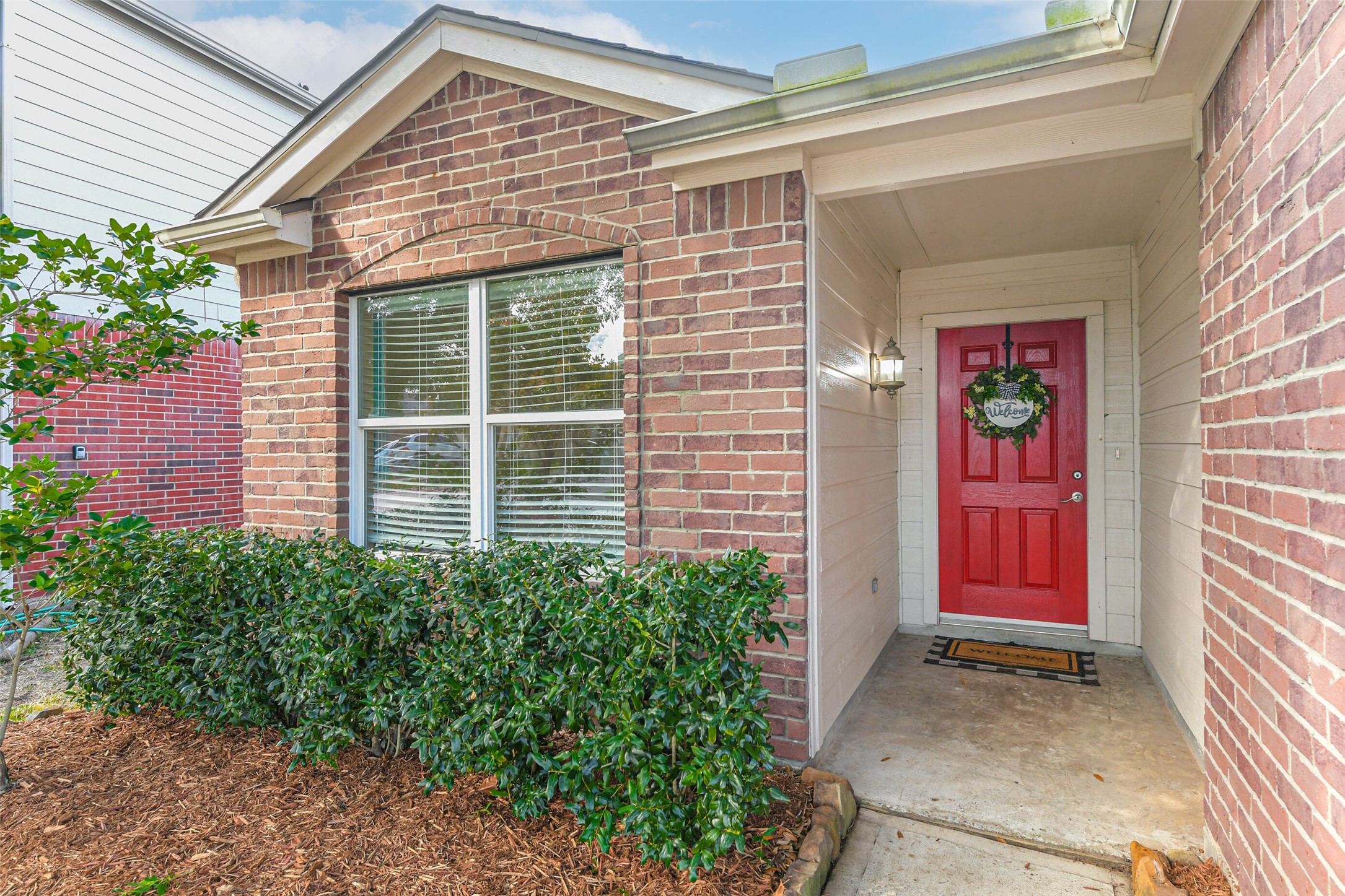 18239 Trinity Knoll Way Humble, TX 77346 - Photo 6 of 38 a view of a entryway door front of house