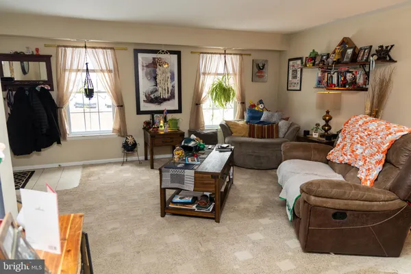 a view of a workspace with furniture