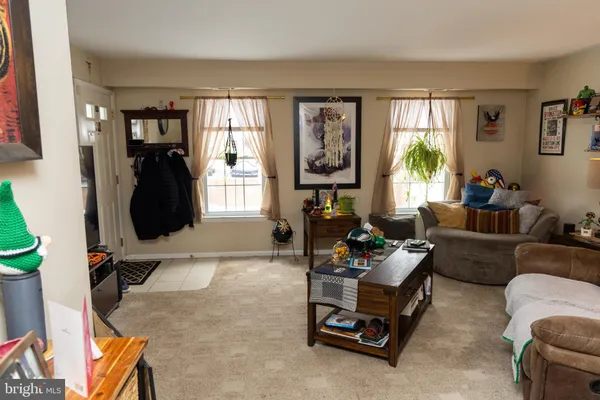 a kitchen with stainless steel appliances granite countertop a sink and a stove
